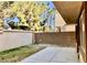 Private backyard with a concrete patio and block wall fence at 224 Wicked Wedge Way, Las Vegas, NV 89148