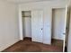Bedroom featuring neutral walls, carpet flooring, and a standard closet at 224 Wicked Wedge Way, Las Vegas, NV 89148