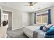 Bedroom featuring a ceiling fan, window with blinds and curtains, and closet at 2333 Mundare Dr, Henderson, NV 89002
