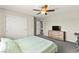 This bedroom includes closet, dresser, television and open access to the rest of the home at 2333 Mundare Dr, Henderson, NV 89002