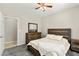 Comfortable bedroom featuring a window with natural light and carpeted flooring at 2333 Mundare Dr, Henderson, NV 89002