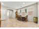 Dining area featuring natural lighting, tiled floors, and traditional furnishings at 2333 Mundare Dr, Henderson, NV 89002