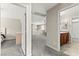 View of the hallway with a bedroom on the left and a bathroom on the right at 2333 Mundare Dr, Henderson, NV 89002