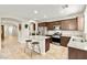 Well-equipped kitchen with stainless appliances, granite counters, and an island with barstool seating at 2333 Mundare Dr, Henderson, NV 89002