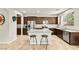 Beautiful kitchen featuring granite countertops, stainless steel appliances, and a center island with seating at 2333 Mundare Dr, Henderson, NV 89002