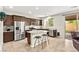 Stylish kitchen with stainless steel appliances, granite countertops, and a breakfast bar for casual dining at 2333 Mundare Dr, Henderson, NV 89002