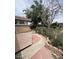 Backyard with a sidewalk and a garden at 2450 Oak Glen Way, Las Vegas, NV 89115