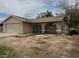 Charming single-story home featuring a garage, front yard, and secure gated windows at 2450 Oak Glen Way, Las Vegas, NV 89115