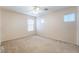 Bright bedroom with carpet flooring and natural light from multiple windows with blinds at 2608 Campobello Ave, North Las Vegas, NV 89081