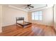 This bedroom features laminate floors, neutral paint, and tray ceilings at 2608 Campobello Ave, North Las Vegas, NV 89081