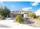 Charming two-story home with a well-manicured lawn and an attached two-car garage at 2608 Campobello Ave, North Las Vegas, NV 89081