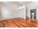 Hardwood floor living room with high ceilings and a staircase to the upper level at 2608 Campobello Ave, North Las Vegas, NV 89081