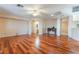 Spacious living room with hardwood floors, recessed lighting, and neutral paint at 2608 Campobello Ave, North Las Vegas, NV 89081