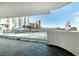 Balcony with glass railings offering panoramic views of the city skyline and palm trees at 2777 Paradise Rd # 303, Las Vegas, NV 89109