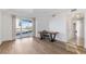Bright bedroom featuring hardwood floors, recessed lighting, and a view to the balcony at 2777 Paradise Rd # 303, Las Vegas, NV 89109