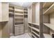 A custom walk-in closet with shelves, drawers, and hanging rods to maximize your storage space at 2777 Paradise Rd # 303, Las Vegas, NV 89109