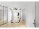 Bright hallway featuring marble floors, recessed lighting, and a view of the living area with a fireplace at 2777 Paradise Rd # 303, Las Vegas, NV 89109