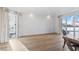 Light filled living room featuring hardwood floors, recessed lighting, and a large window at 2777 Paradise Rd # 303, Las Vegas, NV 89109