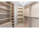 Bright walk-in closet featuring ample shelf space and hanging racks at 2777 Paradise Rd # 303, Las Vegas, NV 89109