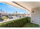 Unit balcony overlooking complex parking with views of the city at 2866 Loveland Dr # 2018, Las Vegas, NV 89109