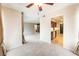 Spacious living room with neutral carpet and walls adjacent to kitchen with stacked washer and dryer at 2866 Loveland Dr # 2018, Las Vegas, NV 89109