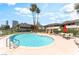 Community pool with lounge chairs, mature trees and plenty of space to relax at 2866 Loveland Dr # 2018, Las Vegas, NV 89109