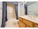 The bathroom features a bathtub with shower and a vanity with wooden cabinets at 3104 Hayden Ct, Las Vegas, NV 89134