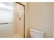 Bathroom featuring walk-in shower with gold trim and a toilet with a white seat at 3104 Hayden Ct, Las Vegas, NV 89134