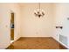 Bright dining space featuring a chandelier and access to the adjacent kitchen at 3104 Hayden Ct, Las Vegas, NV 89134