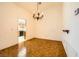 Cozy dining room featuring a chandelier and adjacent kitchen access at 3104 Hayden Ct, Las Vegas, NV 89134
