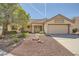 Charming single-story home featuring a well-maintained lawn and a two-car garage at 3104 Hayden Ct, Las Vegas, NV 89134