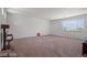 Spacious bonus room with carpet flooring, natural light, and ample space at 33 Via Di Mello, Henderson, NV 89011
