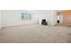 Large, carpeted bonus room with abundant natural light and a neutral color palette at 33 Via Di Mello, Henderson, NV 89011