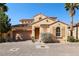 Charming two-story home featuring a tile roof, brick driveway and a two car garage at 33 Via Di Mello, Henderson, NV 89011