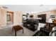 Open concept living room and kitchen with tile and carpet, ideal for entertaining at 33 Via Di Mello, Henderson, NV 89011