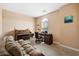 Comfortable home office featuring neutral walls, carpet and a decorative piano at 33 Via Di Mello, Henderson, NV 89011