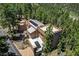 Unique aerial perspective of a home with a turret, blending architectural distinction with natural surroundings at 4162 Matterhorn Way, Las Vegas, NV 89124