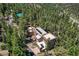 An aerial view of a home surrounded by mature trees offering privacy and seclusion at 4162 Matterhorn Way, Las Vegas, NV 89124