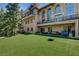 Spacious backyard featuring outdoor seating and manicured lawn at 4162 Matterhorn Way, Las Vegas, NV 89124