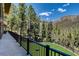 Mountain views from the balcony featuring turf grass and iron railing for outdoor enjoyment at 4162 Matterhorn Way, Las Vegas, NV 89124