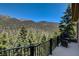 Scenic mountain views can be seen from this balcony with outdoor seating at 4162 Matterhorn Way, Las Vegas, NV 89124