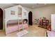 ' bedroom features a playhouse bunkbed and play area with toys and furnishings at 4162 Matterhorn Way, Las Vegas, NV 89124