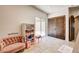 Bonus room offers stone tile floors, neutral walls, and view of outdoors through a glass sliding door at 4162 Matterhorn Way, Las Vegas, NV 89124