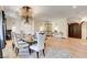 Charming dining room with a chandelier, formal seating, and stylish decor at 4162 Matterhorn Way, Las Vegas, NV 89124