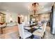 Beautiful dining room with ornate chandelier, dining table, and decorative accents at 4162 Matterhorn Way, Las Vegas, NV 89124