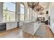 Spacious kitchen with stainless steel appliances, large island with seating, and mountain views at 4162 Matterhorn Way, Las Vegas, NV 89124