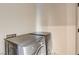 Modern laundry room featuring a front loading washer and dryer at 4162 Matterhorn Way, Las Vegas, NV 89124