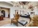 Open-concept living room showcases soaring ceilings, hardwood floors, archways, and stylish furnishings at 4162 Matterhorn Way, Las Vegas, NV 89124