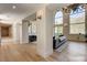 Open floor plan with a view from the hall into the living room and kitchen at 4162 Matterhorn Way, Las Vegas, NV 89124