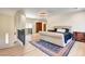 Spacious main bedroom featuring hardwood floors, and elegant furnishings at 4162 Matterhorn Way, Las Vegas, NV 89124
